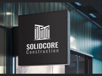Shop sign board mockup for construction branding with a professional outdoor design showcasing the "Solidcore Construction" logo.